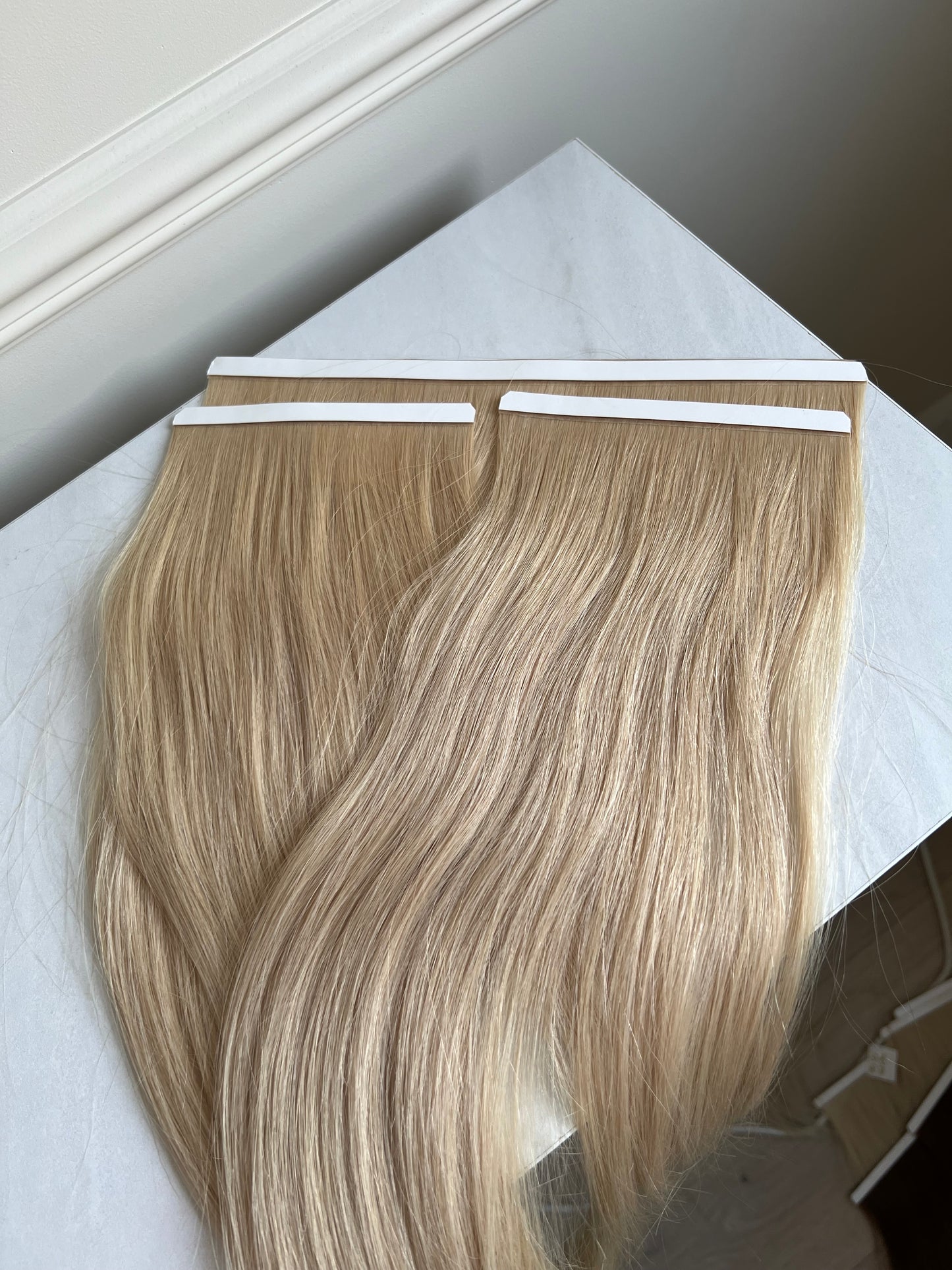 Włosy słowiańskie na taśmach bio tape 84g 54cm blond